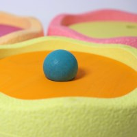 Rollende schijven | Grimm's | Pastel warm